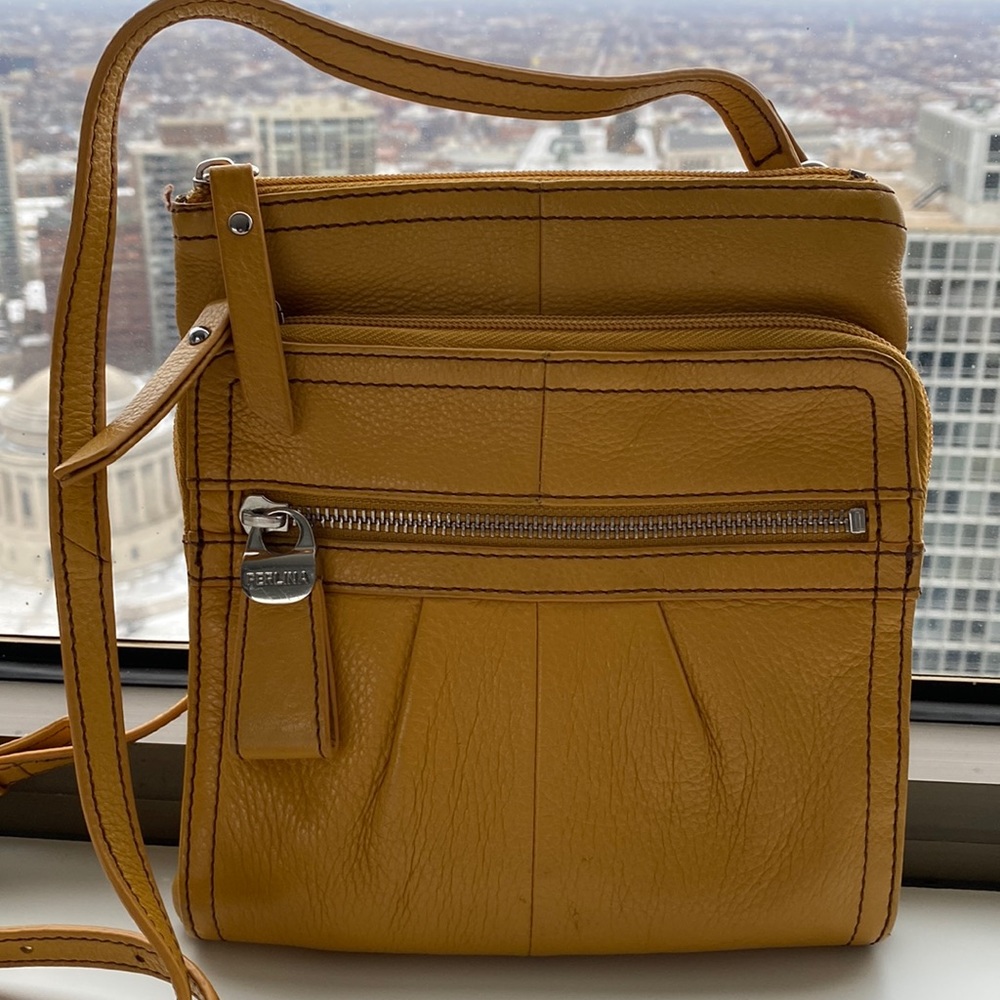 Perlina mustard yellow leather crossbody.